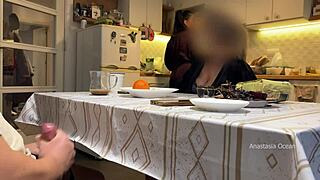 My husband jerking under a table front of my step mom and i right at the kitchen