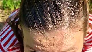 fucking the wet brunette's slobbery mouth with big cock in outdoor forest on hot summer day