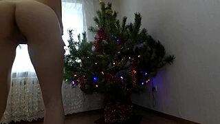 Beautiful Bitch Dancing Seductively Around Christmas Tree with Small Tits Exposed