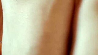 Greta Applying Nail Polish to Toenails