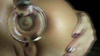 Gaping hot booty object with toys and heels.