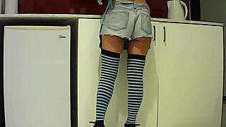 latina brunette eats banana in kitchen and sucks big cock