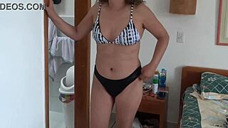 I wear bikini on beach, he films me fascinated by bulge.