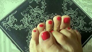 Beautiful brunette enjoys barefoot workout in bedroom