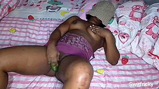 Horny Ebony Fucks Cucumber Toy