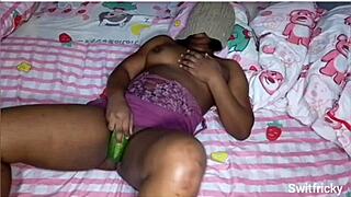 Horny Ebony Fucks Cucumber Toy