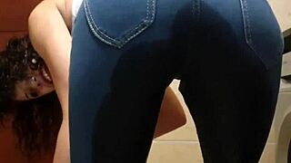 pisswhore peeing in her jeans while smoking and stripping