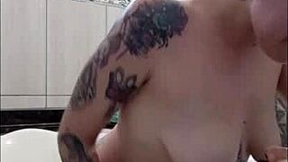 blonde and brunette have teasing sex in the bathtub with cum in mouth