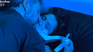 She expertly sucks and licks toes, giving detailed footjobs with big natural tits bouncing