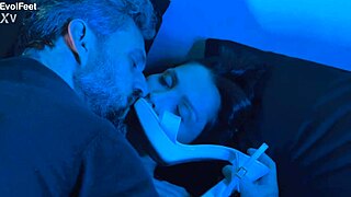 She expertly sucks and licks toes, giving detailed footjobs with big natural tits bouncing