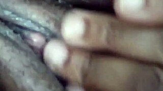 a plump ebony woman enjoys a relaxing massage at home