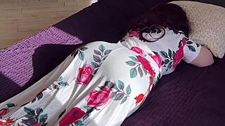 The stepmom relaxes on the bed but gets disturbed by the stepson