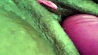 a plump ebony woman enjoys a relaxing massage at home