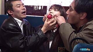 girl in uniform gets under control of a bunch of guys and gives herself up