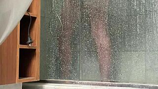 A BBW person is caught engaging in masturbation activities in the shower area quietly