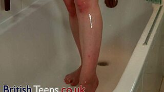 Gorgeous 18 year old gets herself off in the shower
