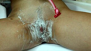 shaving a hairy pussy with a trimmer and a razor with shaving foam runway close-up free