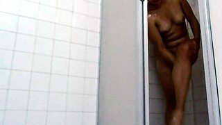 Wet bathroom shower with real couple at home