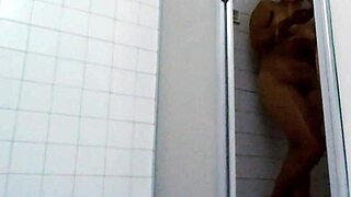 Wet bathroom shower with real couple at home