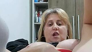 Mature blonde explores her body with toys