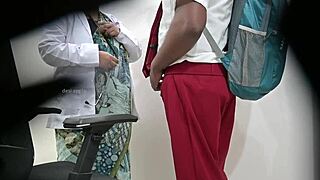 lady doctor is checking a school student dick