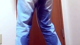 A Girl Pees Jeans in Bathroom