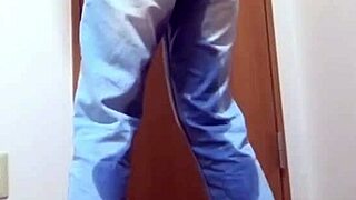 A Girl Pees Jeans in Bathroom