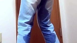 A Girl Pees Jeans in Bathroom