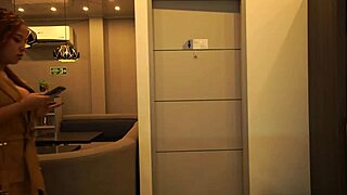 Can a Distracted Busty Redhead Resist a Big Dick in the Men's Bathroom?