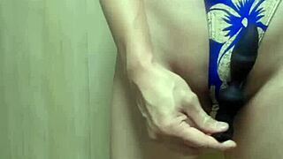 Gorgeous gold leotard babe endures long anal plug tease and training