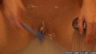 Puffy Redhead Shaves Smooth Pussy Close-Up in Steamy Shower
