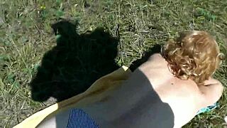 Pervert Catches Beautiful Blonde Sunbathing Naked on Beach Jerks Cock to Outdoor Cumshot POV