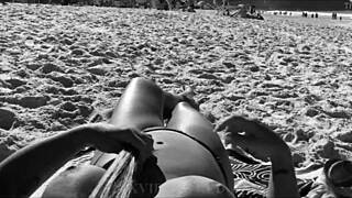 my wife showing off her body on brazilian beaches in public.