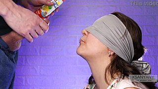 Blindfolded best friend tricked into tasting cum during naughty game close-up