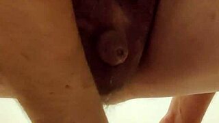 latexi69 teases with buttplug in latex play