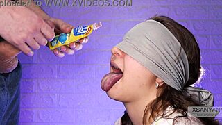 Blindfolded best friend tricked into tasting cum during naughty game close-up