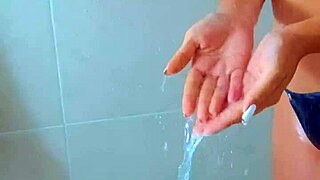 brazilian stunner seduces in dripping wet black thong shower tease