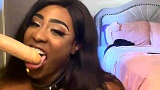 lexi butterfly slurps and spits on wall-mounted cock submission