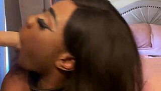 lexi butterfly slurps and spits on wall-mounted cock submission