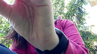 Nicoletta puffs cig in garden flashing huge tits from her shirt