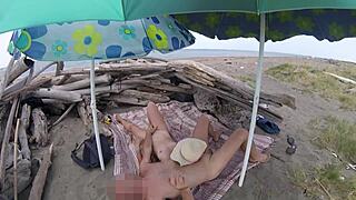 voyeur catches shameless handjob on nudist tenerife beach