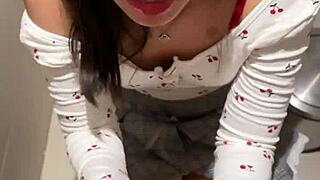 18-year-old asian cutie drops to knees for huge facial cumshot in public restroom blowjob