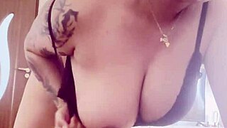 those massive tits spilling out of her tight black bra tease endlessly