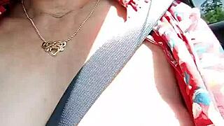 bold housewife rides road flashing huge bouncing tits outdoors