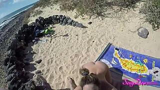 sexy tanned babe strips bares feet for wet pussy pov doggystyle pounding on naughty beach sand