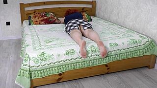 Why does this big tits milf spread wide on bed begging for cock?