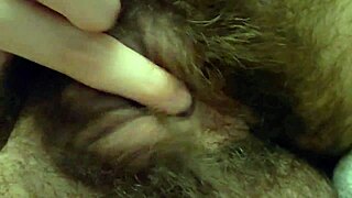 close up on tied clit turning purple from intense play