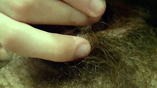 close up on tied clit turning purple from intense play