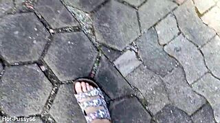 She slips off her flip-flops for a barefoot outdoor tease in the fields