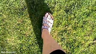 She slips off her flip-flops for a barefoot outdoor tease in the fields